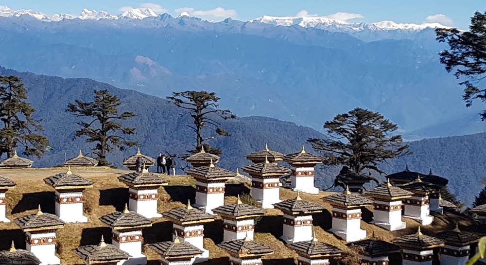 A mountain scene with temples in Bhutan