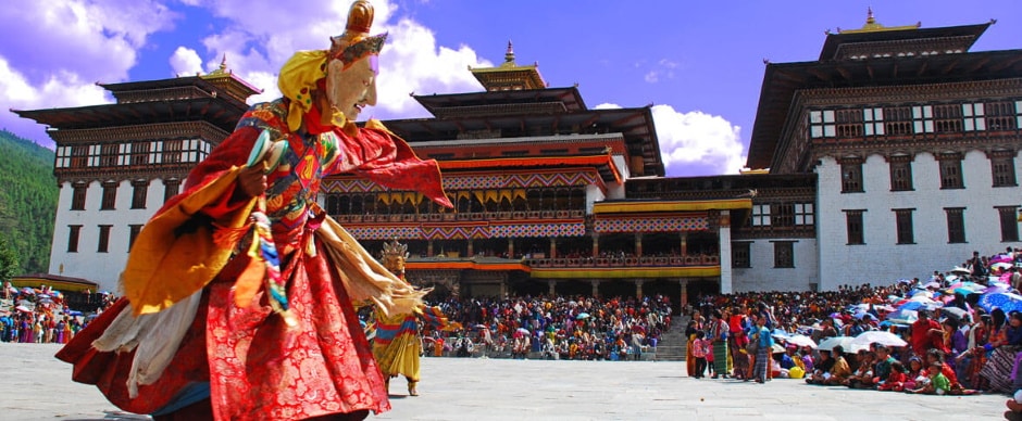 Mystical Bhutan Tour Festival with a large puppet display