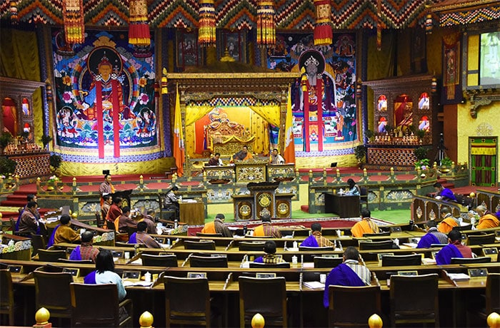 Bhutan's Parliament must be one of the most colourful in the world. Bhutan was granted a democratic Government by the 4th King. Bhutan's Royal Family is revered and still plays an essential role in the well-being and spiritual guidance of Bhutan's citizens.